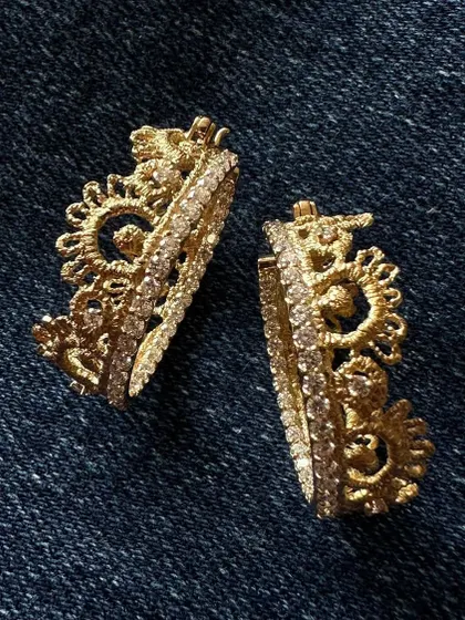 Saturday ready with these handcrafted hoops. The design combines a classic hoop shape with my signature lace like filigree work in 18k gold, finished with a line of sparkling natural diamonds.