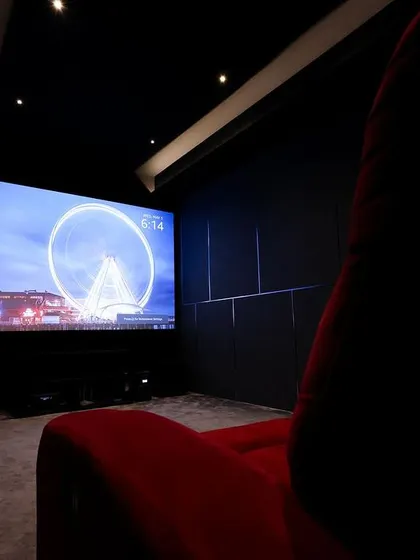 A duplicate of 117, this image again captures the dramatic contrast between the red seats and the dark room.