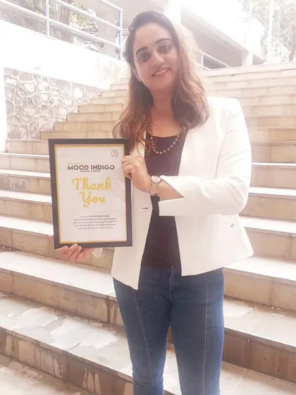 Holding this 'Thank You' frame from Mood Indigo at IIT Bombay. With my college grades, I joked I'd never get in the gate, but following my passion brought me here.