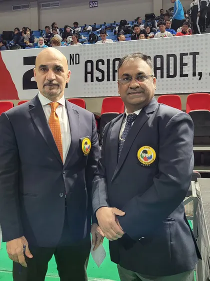With the AKF Referee Commission Chairman, Mansoor Al Sultan. Being part of the international karate fraternity helps me bring a global perspective to my students.