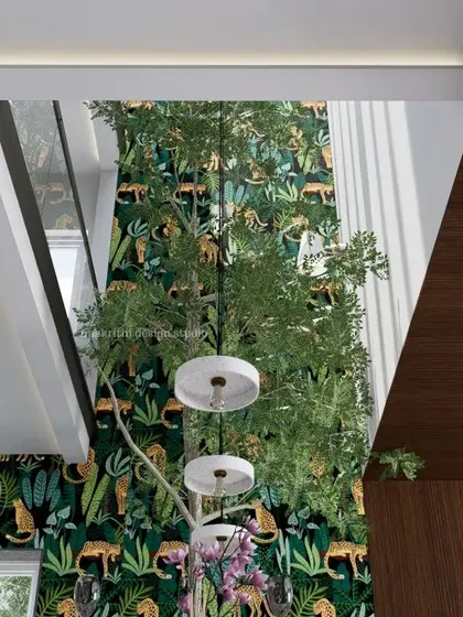 This was our proposed concept for a courtyard in our 'Tranquil' project. We envisioned a fully grown tree in the middle of the house, set against a dark, luxurious background with hanging lights to redefine the idea of an indoor courtyard.