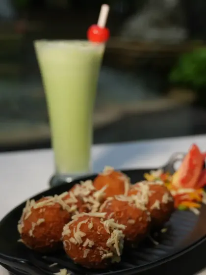 Get ready for a bite of pure bliss with my Crispy Corn Cheese Balls. They are golden and crunchy on the outside, cheesy and gooey on the inside.