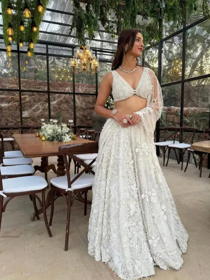 I styled Tripti Dimri in this breathtaking all-white embroidered lehenga by Seema Gujral. The delicate craftsmanship and modern bralette-style blouse make it a perfect example of contemporary Indian couture.