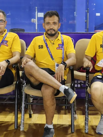 Our coaching and management staff, the backbone of our club, taking a moment during a tournament.
