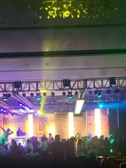 A wide view of the dance floor in full swing, with amazing lighting effects enhancing the atmosphere.