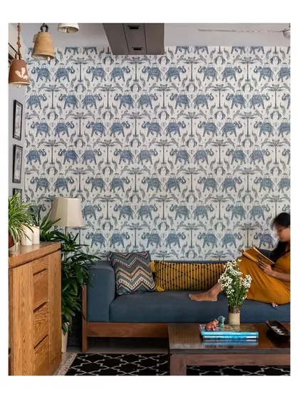 A featured image from Home Publication, showcasing the Boho-Desi lounge. The vibrant wallpaper and cozy reading nook exemplify the "Contemporary Indian Chic" narrative we crafted for this home.