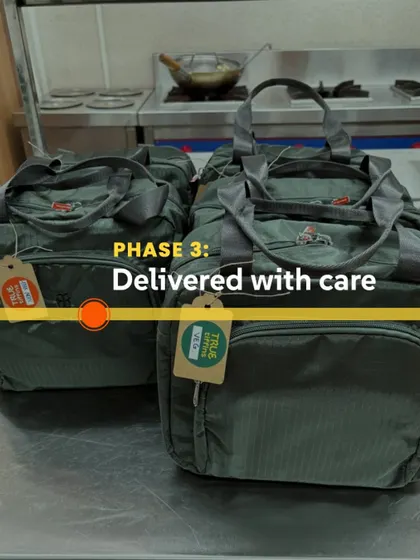 Phase 3: Delivered with care. Our insulated bags are ready to go, ensuring your meal arrives hot and fresh.