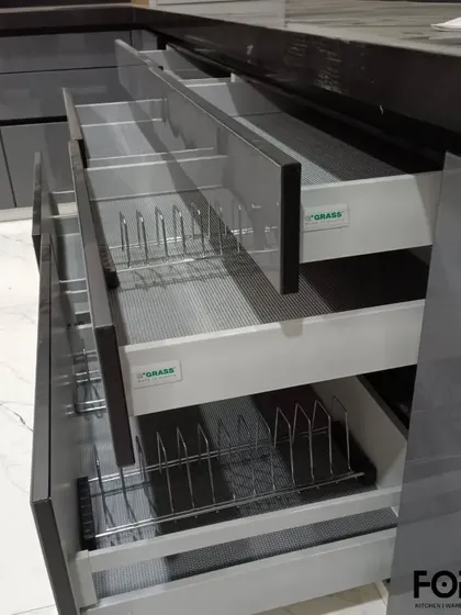 Another example of our high-capacity drawer systems. These Grass tandem drawers feature non-slip mats and adjustable dividers, perfect for storing pots, pans, and other large utensils in an organized manner.