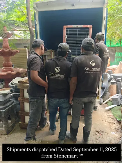 My team, in their Stonemart uniforms, loads shipments for dispatch. I am proud of their dedication to careful handling.