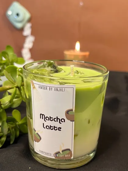 A close-up of the Matcha Latte candle from my collection. The vibrant green and creamy white layers topped with wax "ice" make it a treat for the eyes and nose.
