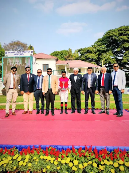 The presentation ceremony for The Sir Charles Todhunter Memorial Trophy with the winning team of West Brook.