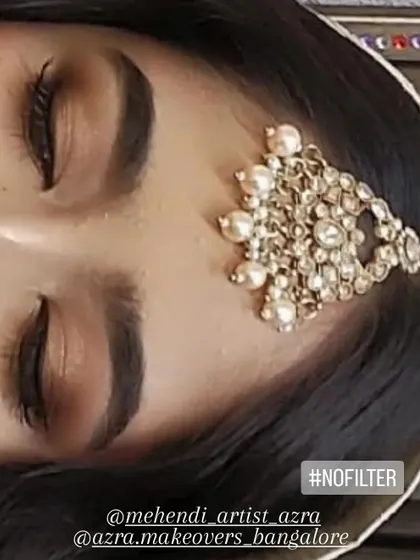 A view of the engagement makeup with eyes closed to show the smooth blending of the eyeshadow. This demonstrates the clean and precise application that ensures the makeup looks great both up close and from a distance.