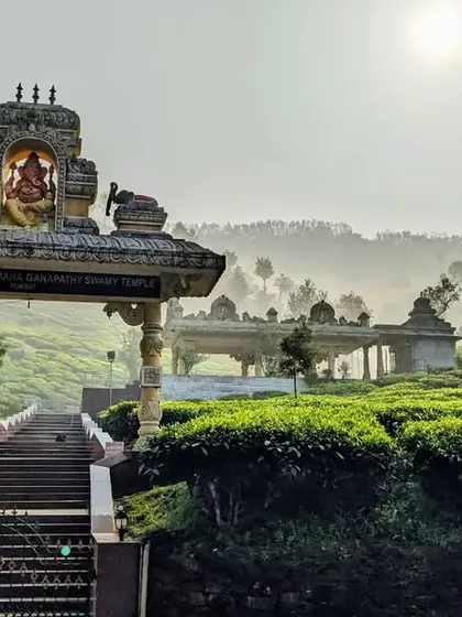The serene Samse Ganapati temple, nestled amidst sprawling tea estates. We often visit this peaceful spot as part of our Nethravathi itinerary.