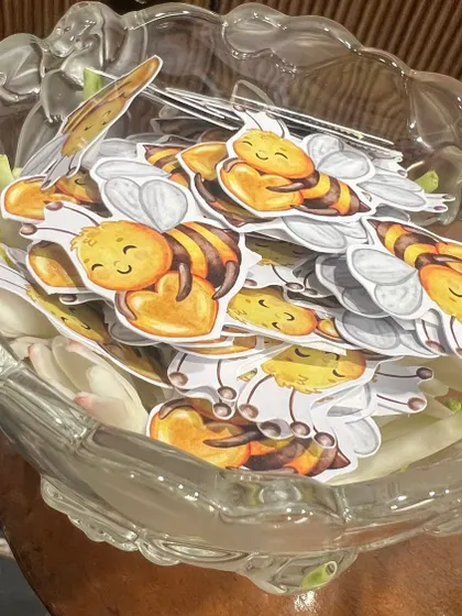 A collection of adorable honeybee-themed cutouts for a "Baby in Bloom" or "Mommy to Bee" shower.