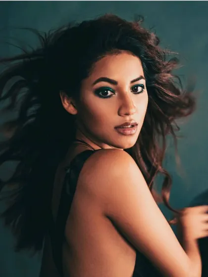 An editorial shot from a lighting workshop, where I styled influencer Shivani Singh. The focus was on creating a dramatic look with a simple black dress, using hair movement and makeup to capture the light.