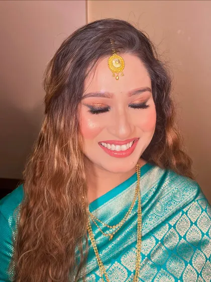 A radiant smile from this beautiful mom-to-be. The makeup for her baby shower was all about enhancing her natural glow.