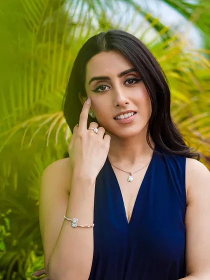 A full view of the jewelry set from the House of Diamondtine campaign. The outdoor setting provides a fresh, natural context that makes the fine jewelry feel accessible and wearable for everyday luxury.