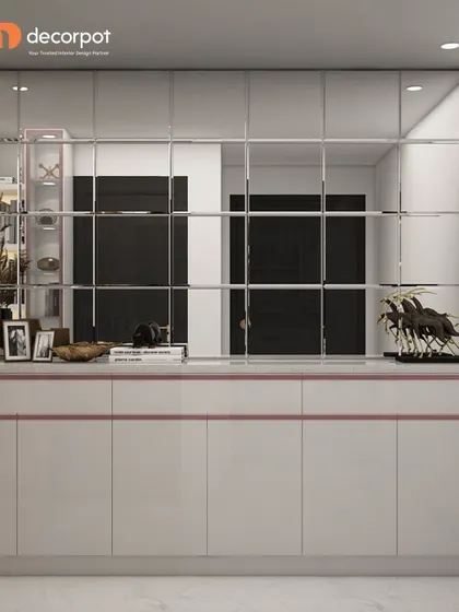 A minimalist yet glamorous crockery or foyer unit. The design uses white handleless cabinets and a fully mirrored back wall with a grid pattern to create a sense of spaciousness and light.