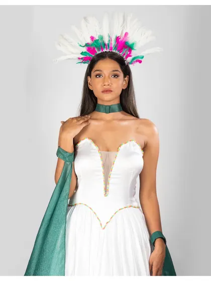 A medium shot that brings focus to the vibrant headpiece and the model's confident expression. The clean lighting ensures the colors are true and vivid.