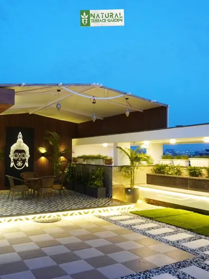 A complete view of the main seating structure in Palam Vihar, with its retractable roof and modern design.