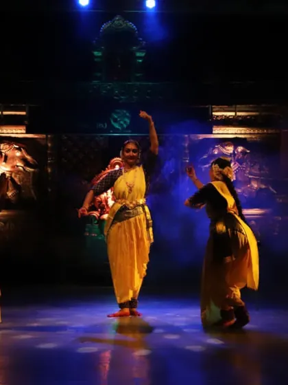 A full gallery from a special performance in my hometown after 25 years, showcasing a full group of dancers on a professionally lit stage.