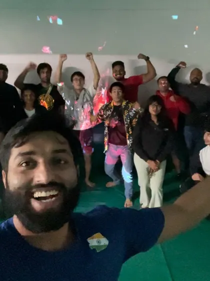 The crew celebrating after an exciting fight at our UFC 308 watch party.