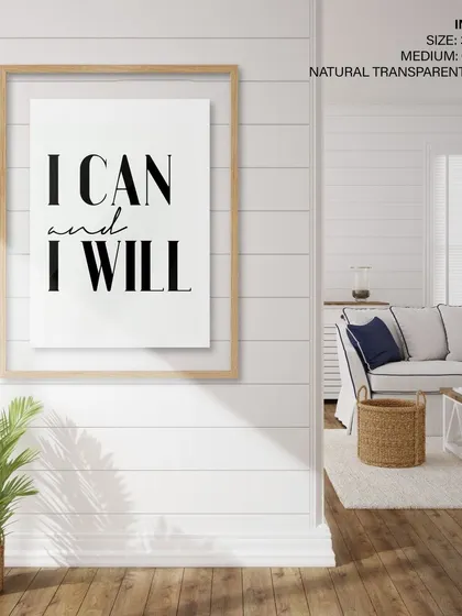 The "I CAN and I WILL" print, elegantly displayed in a natural transparent frame. This minimalist framing style gives the powerful words a light, floating appearance in this bright, modern room.
