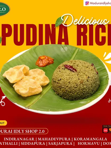 Dive into the aromatic and refreshing flavors of our Pudina Rice. Served on a banana leaf with a side of papad, it's a perfect treat for your palate.