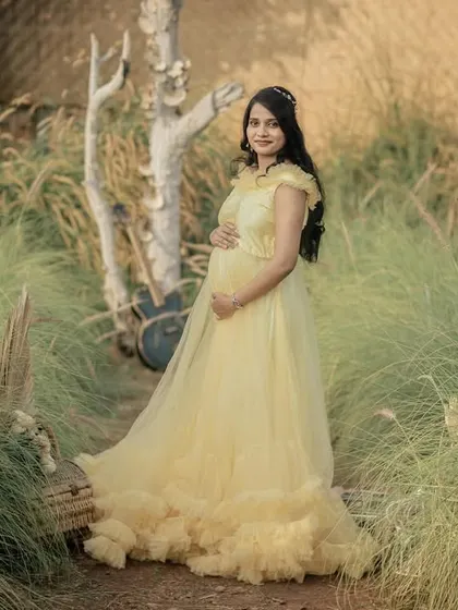 A beautiful portrait in a rustic, grassy setting. The soft light and natural elements create a warm and earthy feel.