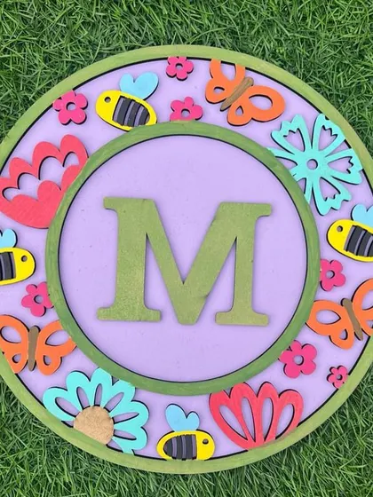 Our new themed monogram paintings are a hit! This floral-themed "M" is a beautiful example of how you can personalize your space with your own artwork.