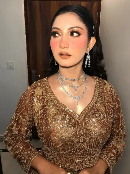 A side profile that highlights the beautiful contour and glowing cheeks.