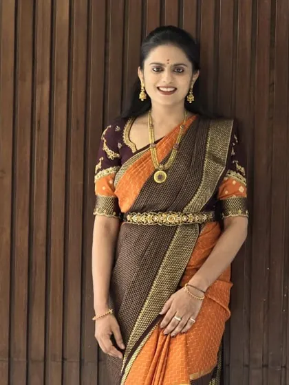 Our lovely client looking elegant in her pure Mysore crepe silk saree. The traditional jewelry perfectly complements the saree's classic design.