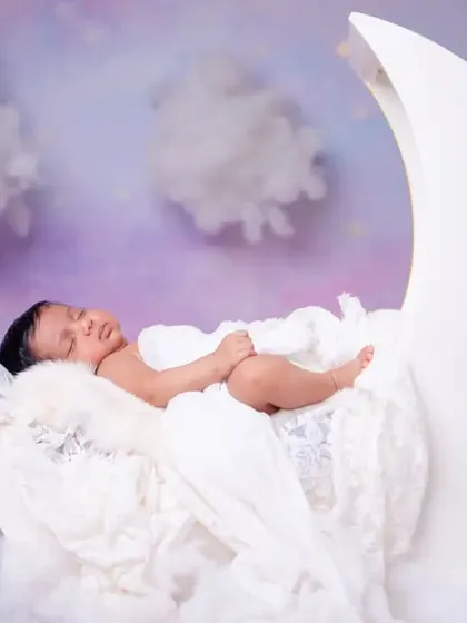 The beginning of a beautiful story, with your baby sleeping on a crescent moon.