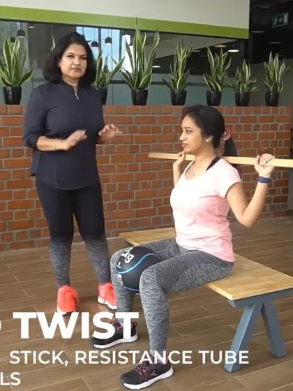Here I am demonstrating proper form for a torso twist. Our practical sessions ensure you can confidently teach and correct a wide variety of exercises for your future clients.