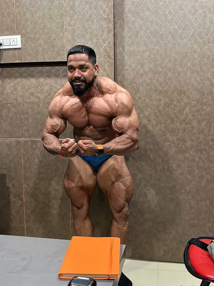 A most muscular pose, 48 days out. This pose showcases overall mass and density.