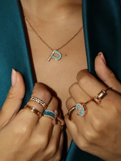 A close-up on the personalized stack, showing how you can mix and match custom pieces with other rings from my collection to build your signature style.