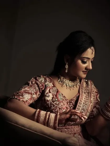 An elegant and moody portrait of the bride-to-be, using dramatic lighting to highlight her features.