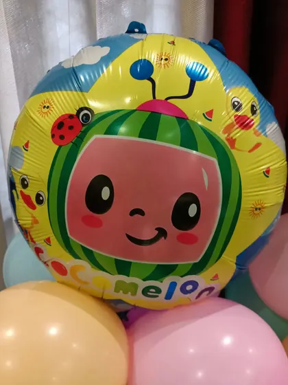 The iconic Cocomelon TV logo as a foil balloon.