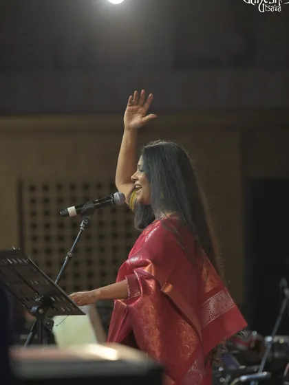 Waving to the audience at the Bengaluru Ganesh Utsava. The connection with the listeners is the most rewarding part of any performance.