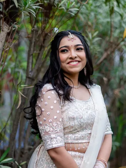 A beautiful, happy bride. The makeup is light and fresh, allowing her to feel comfortable and look stunning all night.