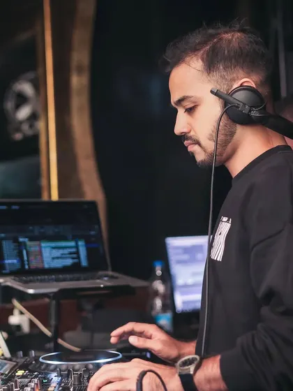 A serious moment of concentration, ensuring the next track blends seamlessly.