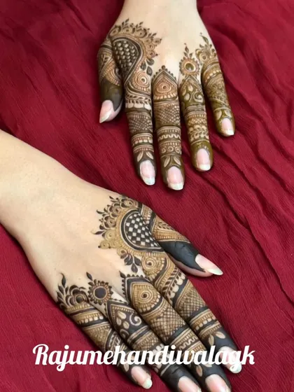 A simple and chic design focusing on the fingers and a small cuff. This is ideal for guests who want a minimal touch of henna for a festive occasion.