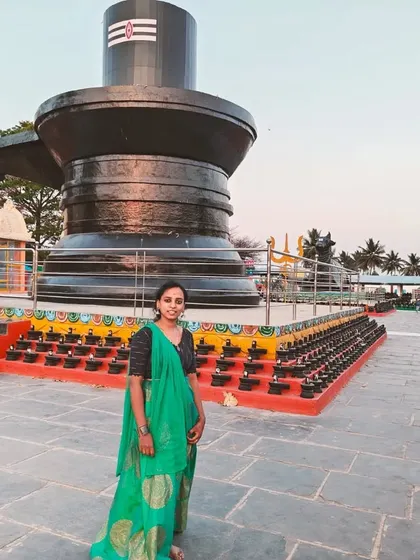 Standing in front of the giant Shivalingam at Kotilingeshwara Temple.