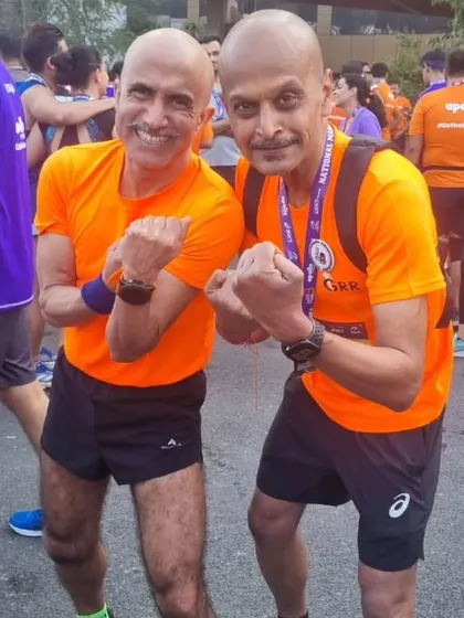 Two of our seasoned warriors at the Apollo Tyres New Delhi Marathon. The camaraderie and shared experience make every race memorable.