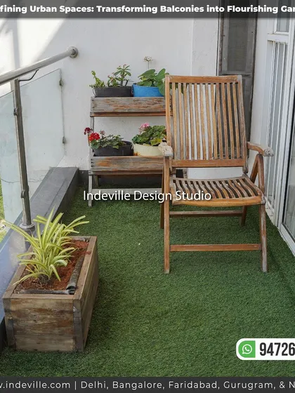 Another angle of the balcony with a wooden lounge chair and planters. The glass railing provides an open view, making the small space feel larger.