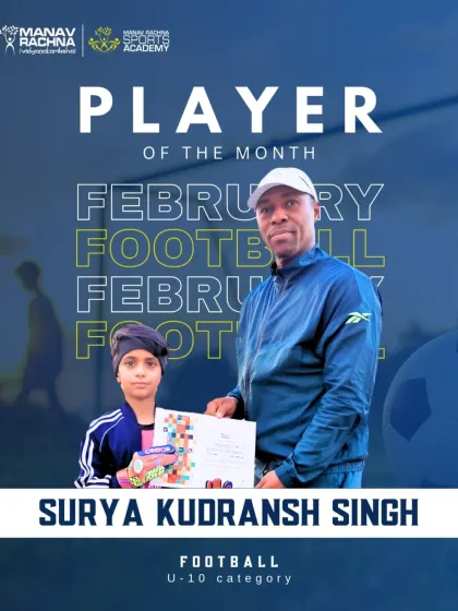 Surya Kudransh Singh, our Football Player of the Month for February (U-10), receiving his certificate from Coach Michael.