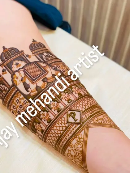 The design in progress, with the elephant procession now filled in with beautiful details and shading.