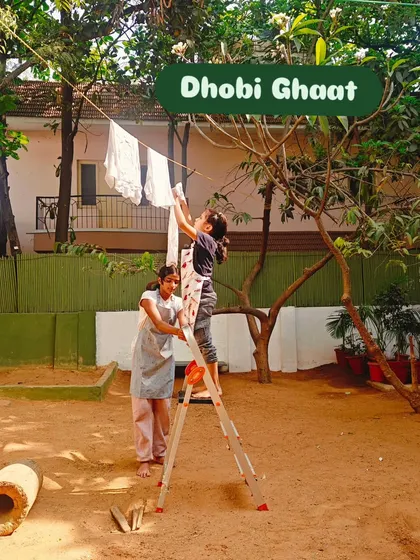 As part of their fundraiser for People for Animals, children hang up freshly tie-dyed t-shirts to dry, a setup they called their "Dhobi Ghaat."