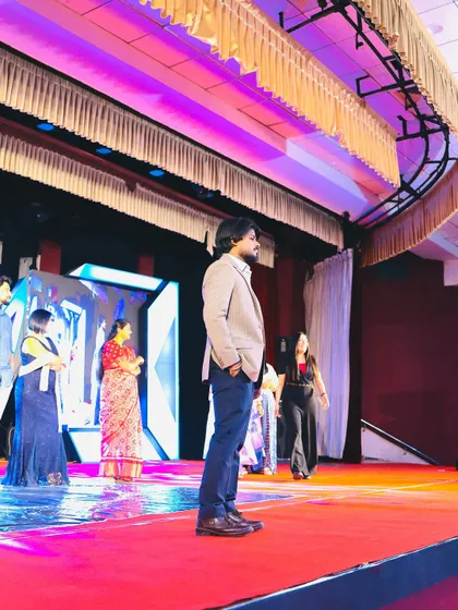 On stage at an awards ceremony. My dream is to see my students on stages like this, achieving their own goals.