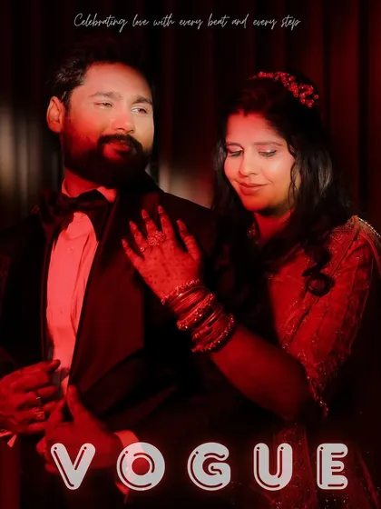 A stylish, vogue-inspired portrait of the couple. The dramatic red lighting and their confident poses create a high-fashion look, perfect for a glamorous cocktail night.